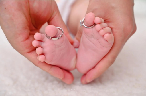 九江宝宝发烧手心比额头烫